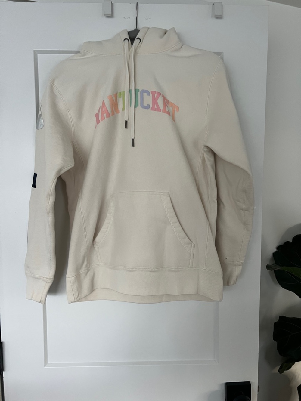 Cream Nantucket Logo Hoodie with Pastel Rainbow Print and fun patches/emblems